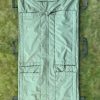 Close-up view of hypothermia check pockets integrated into waterproof sleeping bag