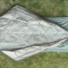 Emergency waterproof sleeping bag with hypothermia monitoring access holes for first aid situations