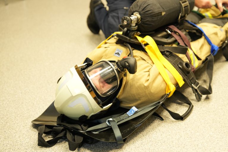 Firefighter securily prepared for evaluation with equipment